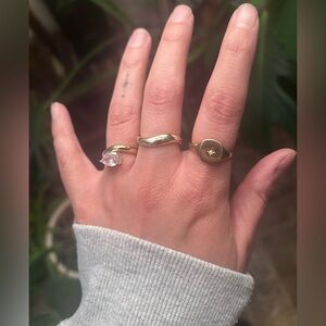 Set of 3 gold toned Pavoi rings